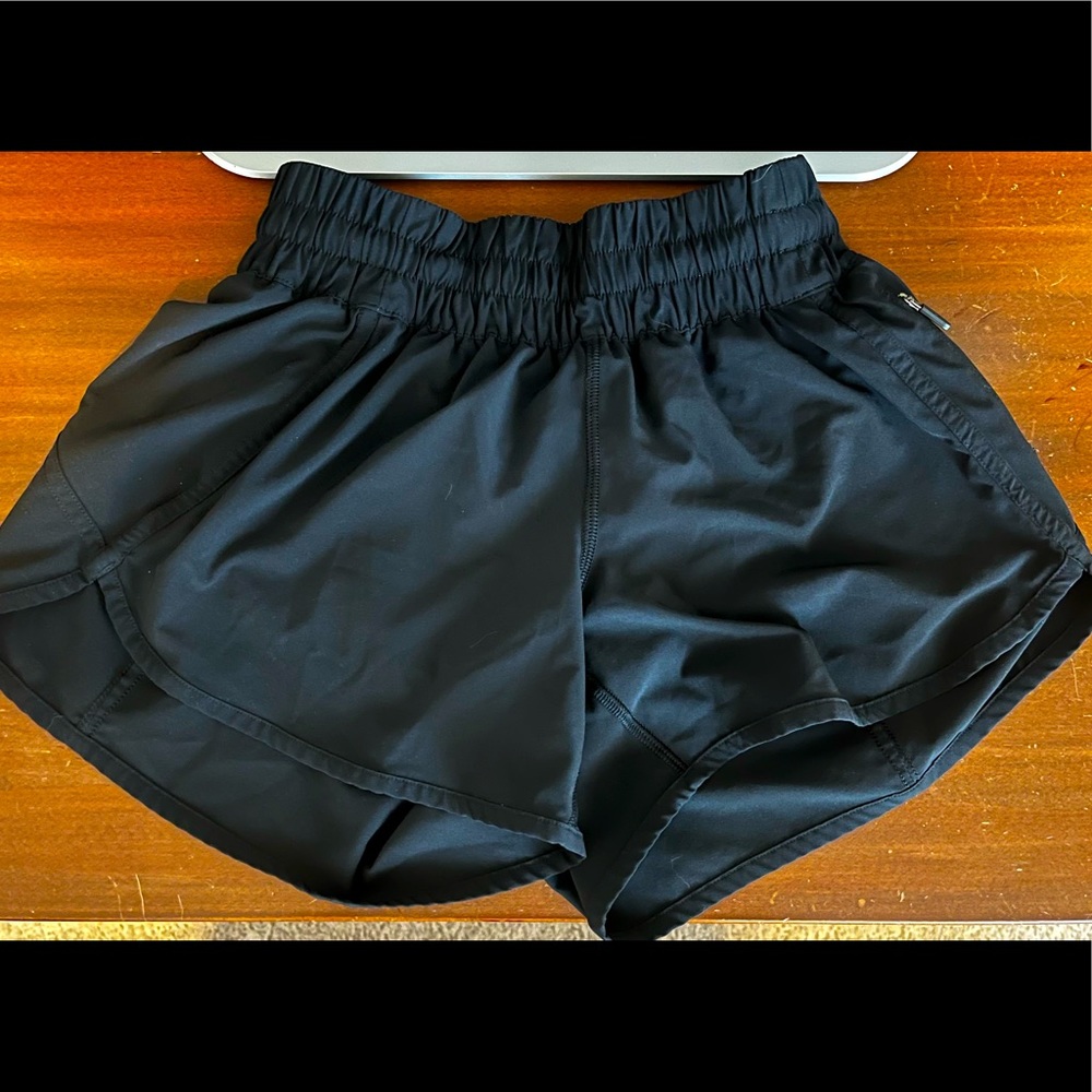 Lululemon 4 inch Track that style shorts- black, size 6